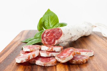 spanish sausages on wooden textured background