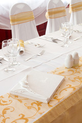 table set for wedding with white guest book