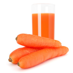Carrot juice glass and carrot tubers