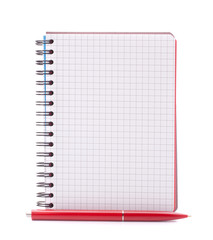 Open blank checked notebook with red pen