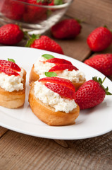 Cottage cheese cream toast with a slices of strawberry 