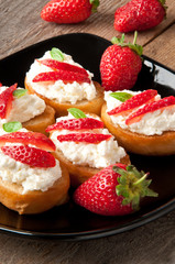 Cottage cheese cream toast with a slices of strawberry 