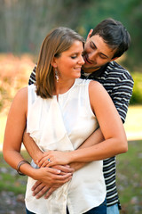 Obraz premium Young Couple In Love Playfully Embrace