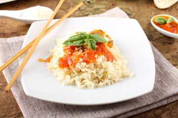 Rice with tomato sauce and basil
