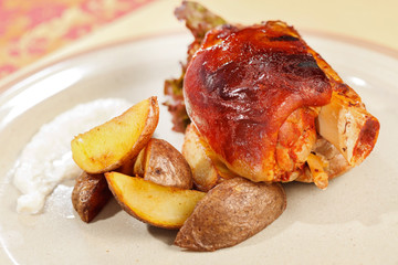 roasted pork knuckle with potatoes