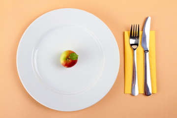 healthy eating - fresh apple on plate