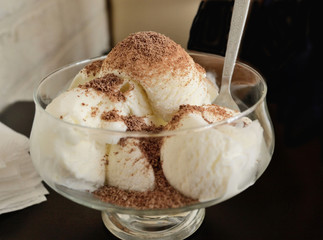 ice cream with chocolate in a cafe