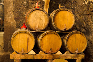 An old wine cellar with oak barrels