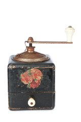 Old coffee grinder on a white background.