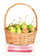 ripe pears in basket isolated on white.