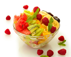 fresh fruits salad in bowl  and berries, isolated on white