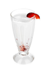 Delicious milk shake with fruit isolated on white