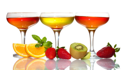 fruit jelly in glasses and fruits isolated on white