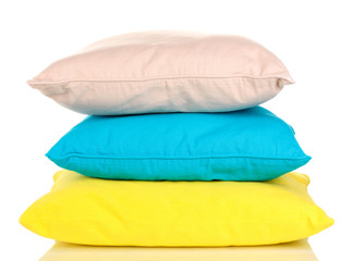 Fototapeta na wymiar Bright color pillows isolated on white