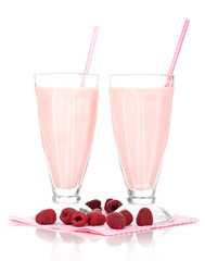 Raspberry milk shakes isolated on white