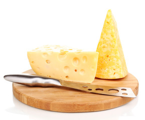 tasty cheese and knife on wooden board isolated on white