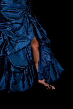 leg in blue dress