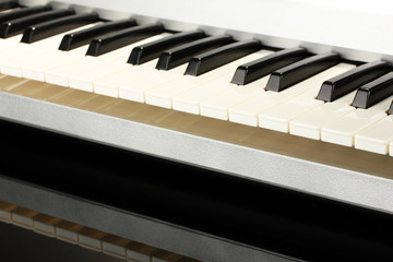 Naklejka premium background of piano keyboard, close up