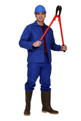 workman holding pliers