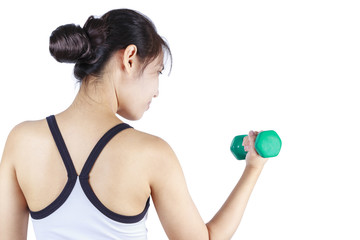 Young asian woman lifting a dumbbell