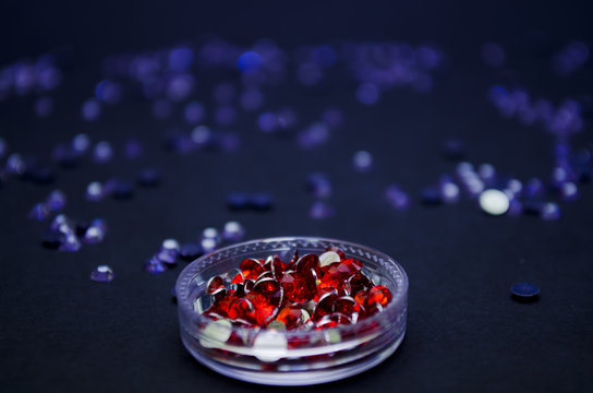 Red Crysal in a transparent dish