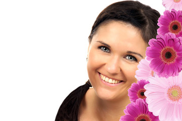 Portrait of a young brunette woman with flowers