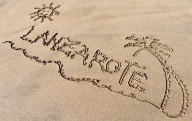 Lanzarote, sand writing on the beach of El Papagayo