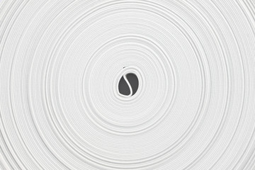 Fototapeta na wymiar Center of white elastic roll on white background.