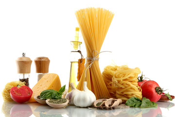 Pasta spaghetti, vegetables, spices and oil, isolated on white
