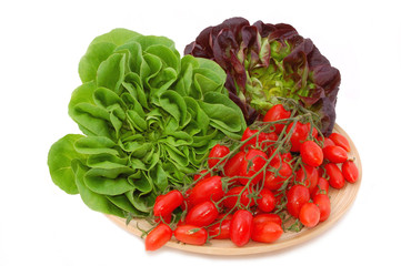 fresh vegetables  lettuce salad and cherry tomatoes isolated