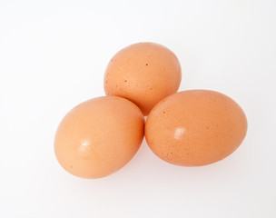 Three Eggs on White