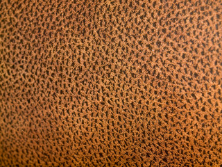 Closeup of Brown Cloth with Random Black Speckles