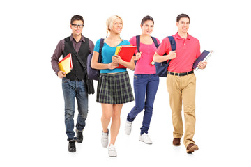 Obraz premium Full length portrait of male and female students
