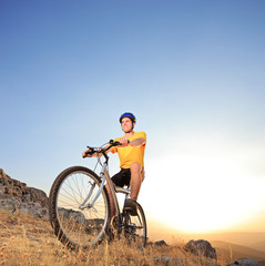 Fototapeta na wymiar Person riding a mountain bike