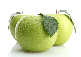 Ripe green apples with leaves  isolated on white