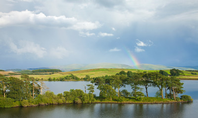 rainbow over a lake