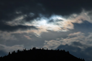 Night clouds in the mountains.