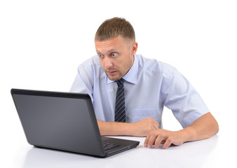 Businessman look at the screen laptop on white