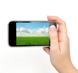 woman hand holding the phone with the image