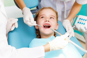 Little girl visiting dentist