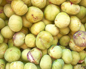 raw fresh green figs, natural background