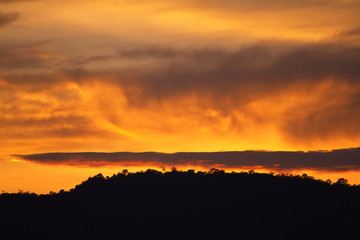 Fototapeta premium Beautiful fiery sunset, the evening sky in the fire