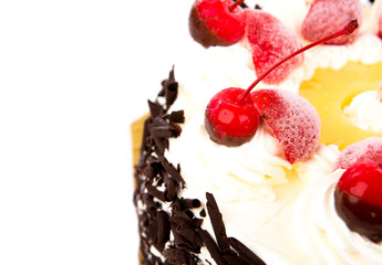 Chocolate cake with red cherries