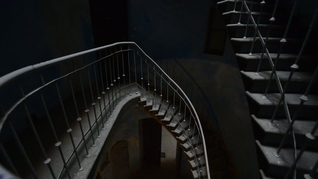 Grunge, dark and old staircase in abandoned building