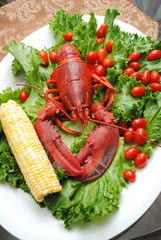 Whole Lobster on Lettuce with Corn and Tomatoes