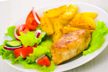 chicken fillet with fresh vegetable salad