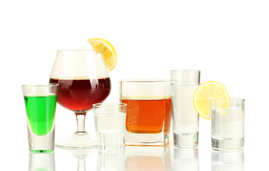a variety of alcoholic drinks isolated on white