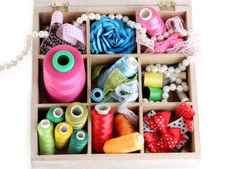thread and material for handicrafts in box isolated on white