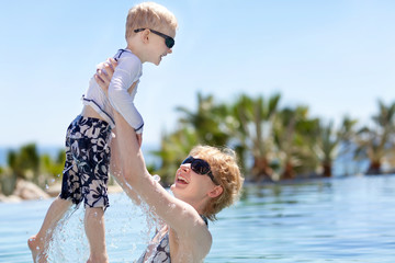 mother and her son in the pool