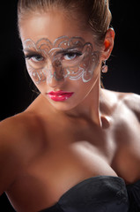 young woman with lace makeup